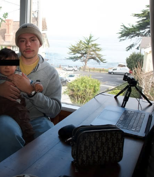 AJ, co-founder of Ophir Scales, at his laptop